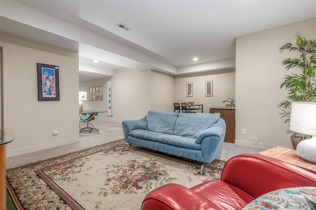 6761 Alan Dr, Denver, CO 80221 - carpeted living area with recessed lighting and baseboards