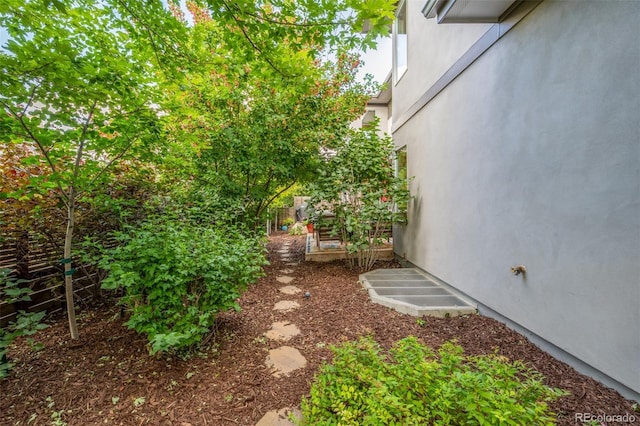 6761 Alan Dr, Denver, CO 80221 - view of yard featuring a vegetable garden