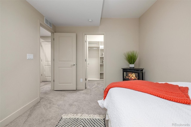 6761 Alan Dr, Denver, CO 80221 - carpeted bedroom featuring baseboards and a spacious closet