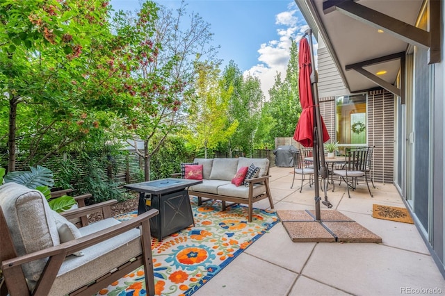6761 Alan Dr, Denver, CO 80221 - fenced backyard with an outdoor living space, a patio area, and outdoor dining space