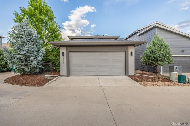 6761 Alan Dr, Denver, CO 80221 - view of front of house featuring a garage