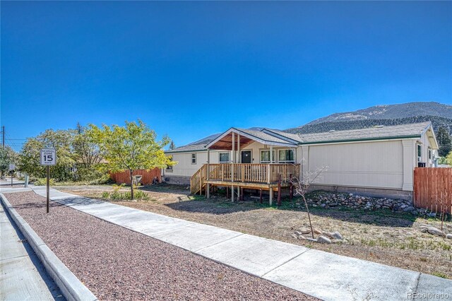 205 Sabeta Ave, Poncha Springs, CO 81242 - manufactured / mobile home featuring a mountain view and fence