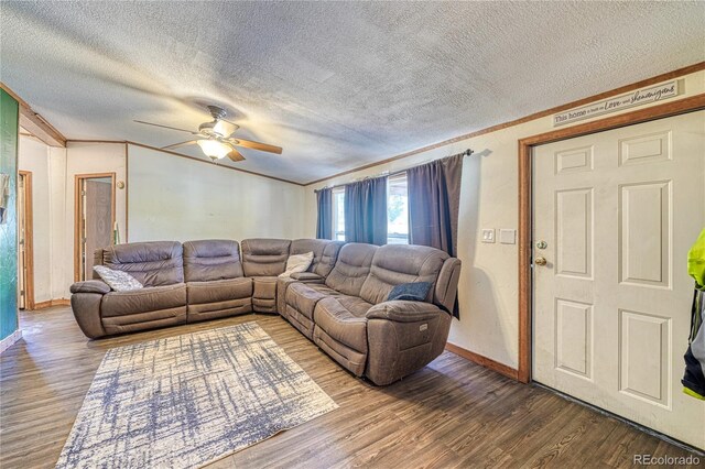 205 Sabeta Ave, Poncha Springs, CO 81242 - living area featuring wood finished floors, a ceiling fan, a textured ceiling, baseboards, and lofted ceiling