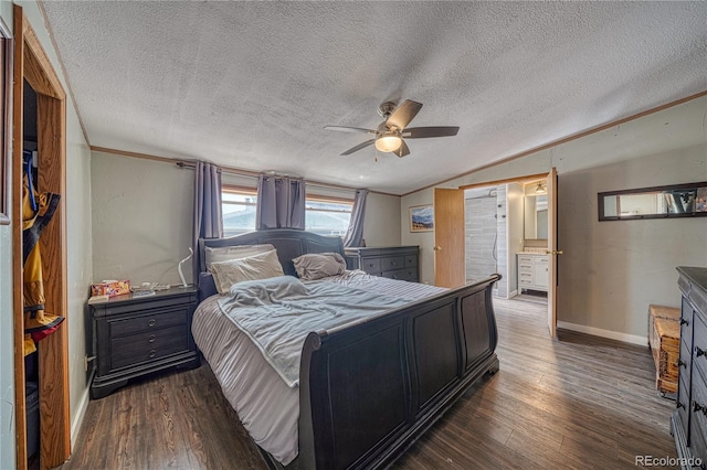 bedroom with a textured ceiling, dark hardwood / wood-style floors, ensuite bathroom, ornamental molding, and ceiling fan