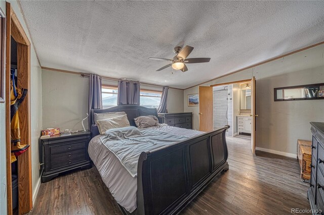 205 Sabeta Ave, Poncha Springs, CO 81242 - bedroom with vaulted ceiling, wood finished floors, baseboards, a textured ceiling, and ceiling fan