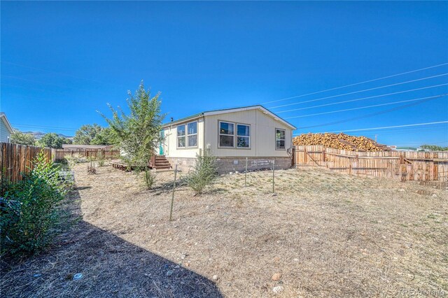 205 Sabeta Ave, Poncha Springs, CO 81242 - back of house featuring a fenced backyard