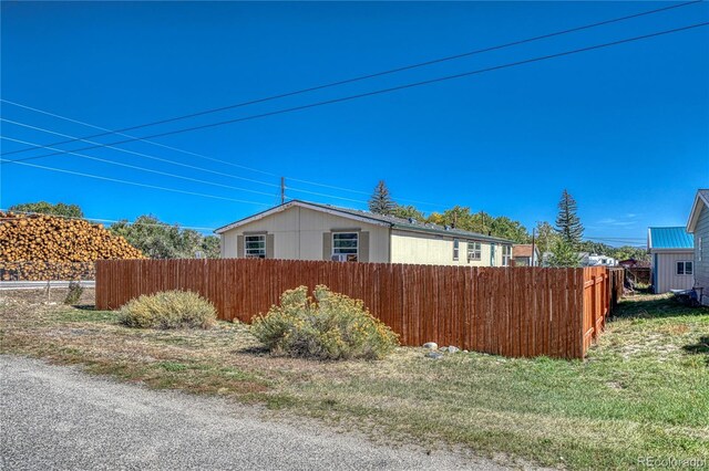 205 Sabeta Ave, Poncha Springs, CO 81242 - view of side of home with fence