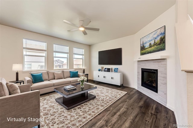 13376 Willow St, Thornton, CO 80602 - living room with a ceiling fan, dark wood-style flooring, and a tile fireplace