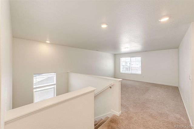 13376 Willow St, Thornton, CO 80602 - hallway with an upstairs landing, carpet floors, and recessed lighting