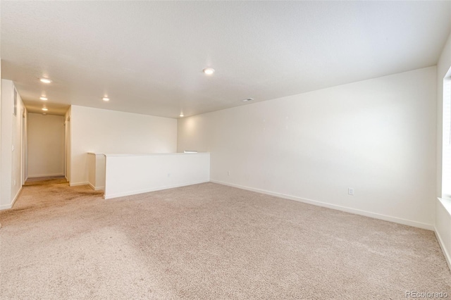 13376 Willow St, Thornton, CO 80602 - empty room featuring light colored carpet and recessed lighting