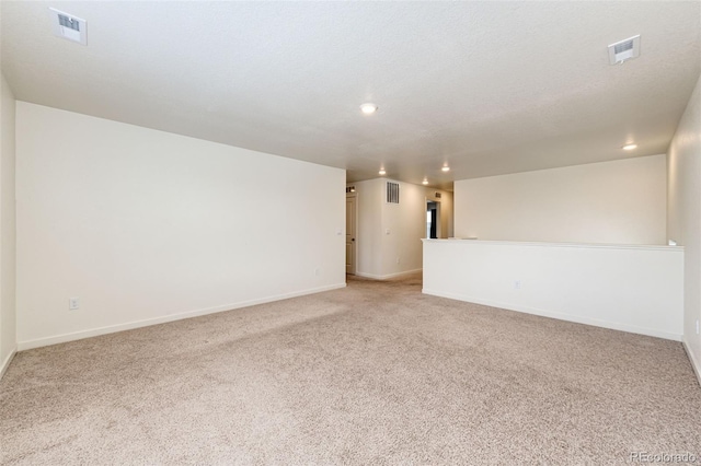 13376 Willow St, Thornton, CO 80602 - empty room featuring light colored carpet and recessed lighting