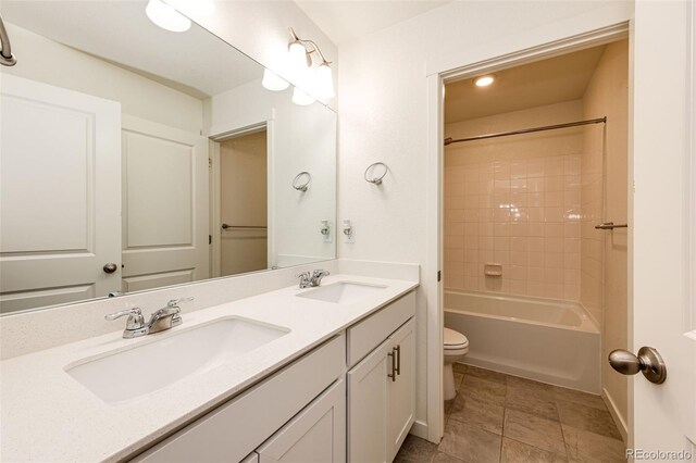 13376 Willow St, Thornton, CO 80602 - bathroom with double vanity,  shower combination, and tile patterned floors