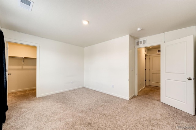 13376 Willow St, Thornton, CO 80602 - unfurnished bedroom with carpet flooring, a spacious closet, and recessed lighting