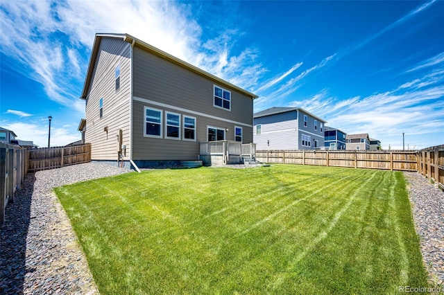 13376 Willow St, Thornton, CO 80602 - rear view of property featuring a fenced backyard and a deck