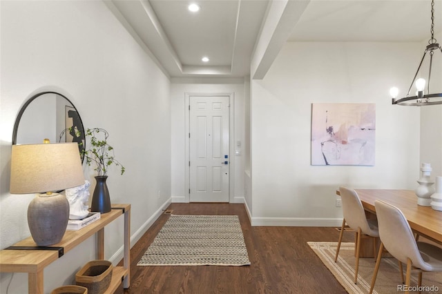 4011 W 149th Ave, Broomfield, CO 80023 - entrance foyer with wood finished floors, a chandelier, and recessed lighting