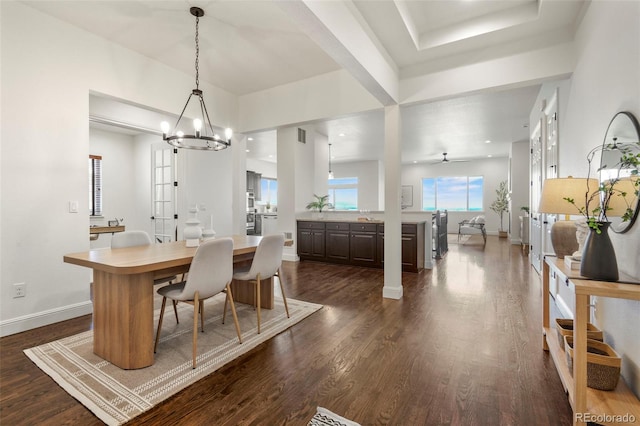 4011 W 149th Ave, Broomfield, CO 80023 - dining room featuring a chandelier, dark wood-style flooring, and a ceiling fan