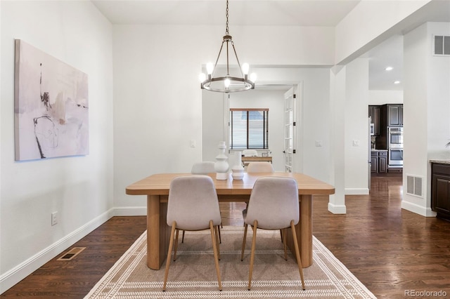 4011 W 149th Ave, Broomfield, CO 80023 - dining area with dark wood finished floors, a chandelier, and recessed lighting
