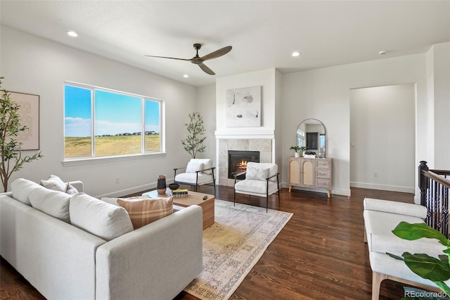 4011 W 149th Ave, Broomfield, CO 80023 - living room featuring ceiling fan, dark wood finished floors, a tiled fireplace, and recessed lighting