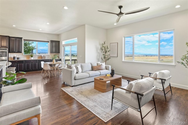4011 W 149th Ave, Broomfield, CO 80023 - living area featuring recessed lighting, a ceiling fan, and dark wood-style flooring