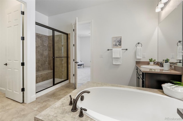 4011 W 149th Ave, Broomfield, CO 80023 - bathroom with vanity, a bath, and a stall shower
