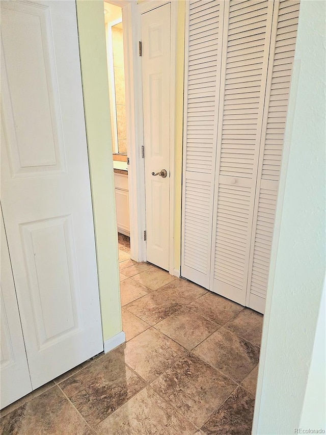 13304 E Asbury Dr, Aurora, CO 80014 - hallway with stone tile floors