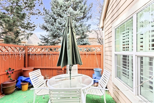 13304 E Asbury Dr, Aurora, CO 80014 - fenced backyard featuring outdoor dining area