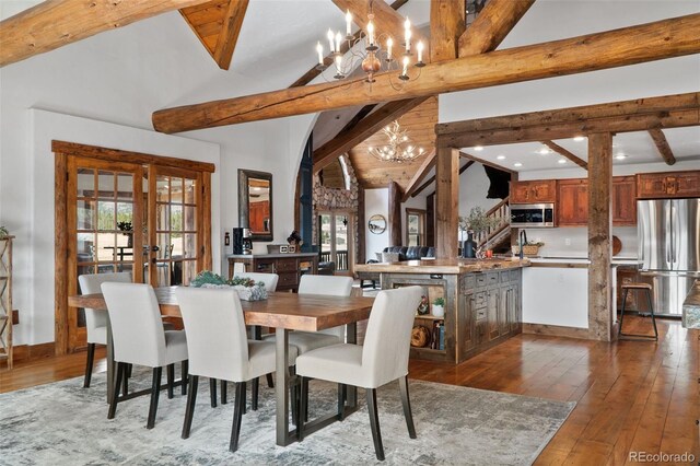 700 Cottage Grove Rd, Alma, CO 80420 - dining area with a chandelier, dark wood finished floors, recessed lighting, french doors, and baseboards