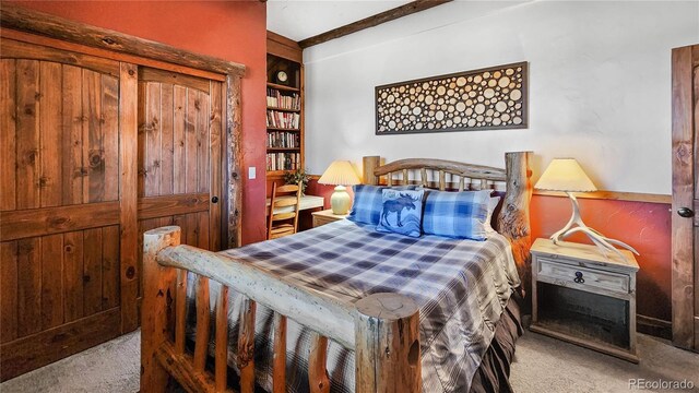 700 Cottage Grove Rd, Alma, CO 80420 - bedroom with carpet floors and beam ceiling