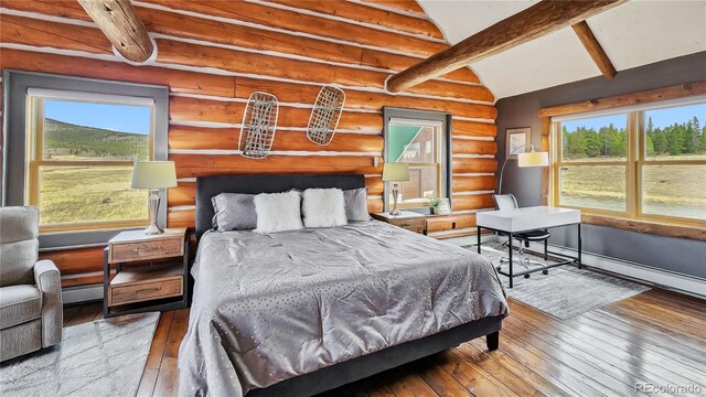 700 Cottage Grove Rd, Alma, CO 80420 - bedroom featuring hardwood / wood-style flooring and log walls