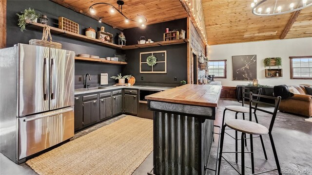 700 Cottage Grove Rd, Alma, CO 80420 - kitchen with freestanding refrigerator, wood ceiling, a sink, open shelves, and open floor plan