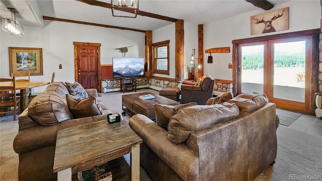 700 Cottage Grove Rd, Alma, CO 80420 - carpeted living area featuring a wainscoted wall and healthy amount of natural light