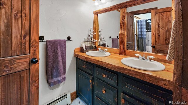 700 Cottage Grove Rd, Alma, CO 80420 - bathroom with double vanity and baseboard heating