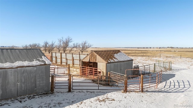 exterior space with an outbuilding and a rural view