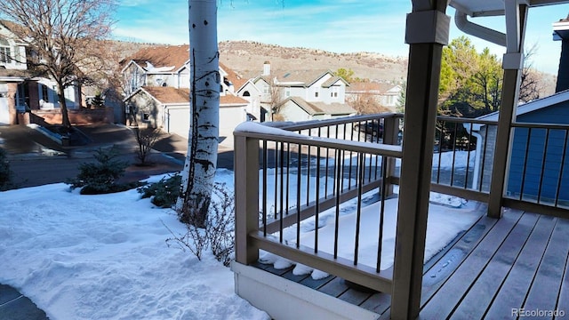 view of snow covered deck