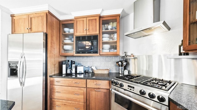 kitchen with tasteful backsplash, crown molding, wall chimney exhaust hood, and appliances with stainless steel finishes