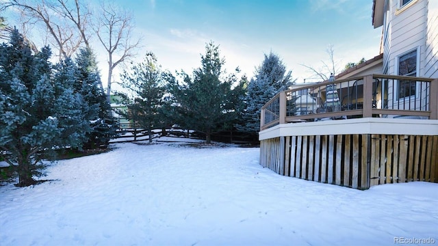 view of yard covered in snow