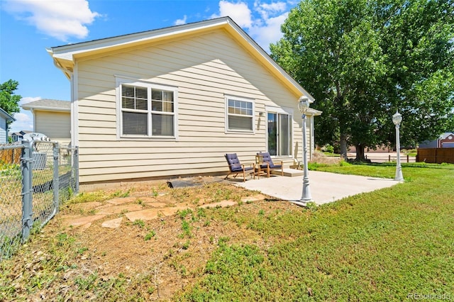6963 Maram Way, Fountain, CO 80817 - rear view of house featuring a patio