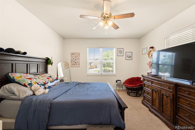 6963 Maram Way, Fountain, CO 80817 - bedroom with light colored carpet and a ceiling fan
