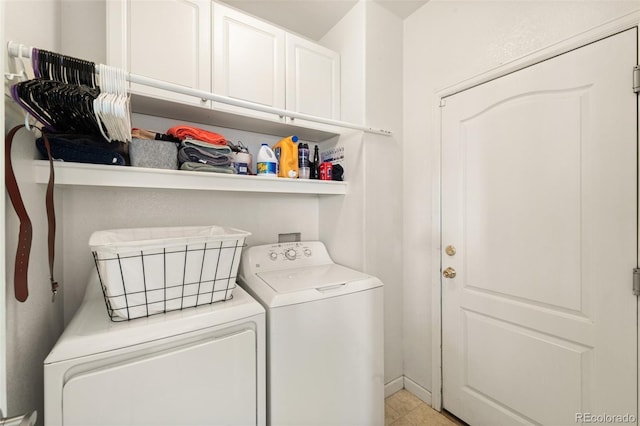 6963 Maram Way, Fountain, CO 80817 - laundry area with cabinet space and washing machine and clothes dryer
