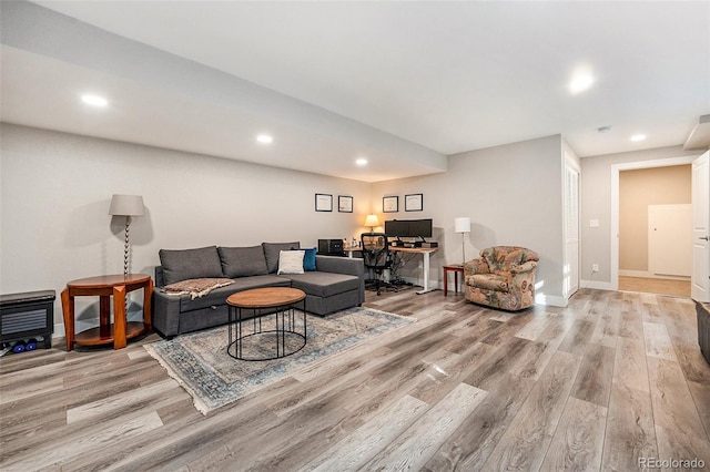 living room with light hardwood / wood-style floors