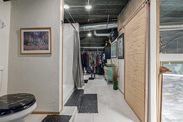 interior space featuring light tile patterned floors