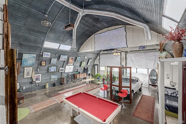 playroom featuring high vaulted ceiling, finished concrete flooring, and pool table