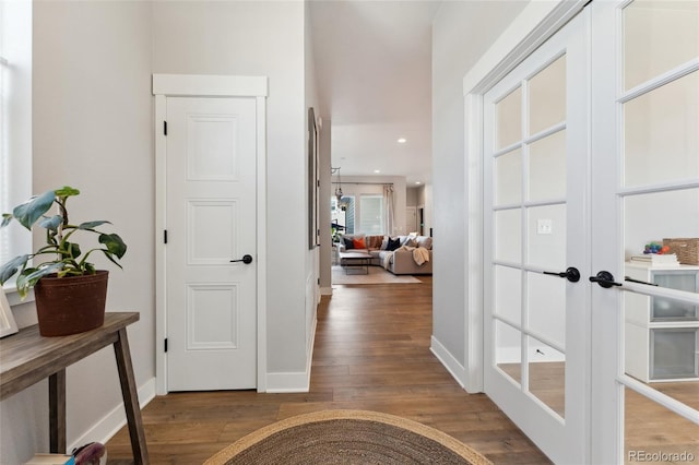 20998 E 60th Pl, Aurora, CO 80019 - hallway with french doors, wood finished floors, and recessed lighting