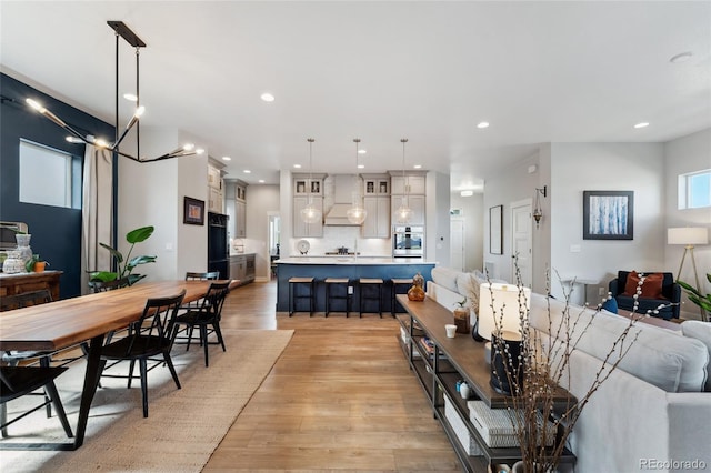 20998 E 60th Pl, Aurora, CO 80019 - dining area featuring light wood-style floors and recessed lighting