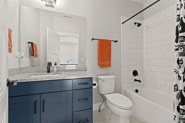 20998 E 60th Pl, Aurora, CO 80019 - bathroom with vanity, shower / tub combo, and tile patterned floors