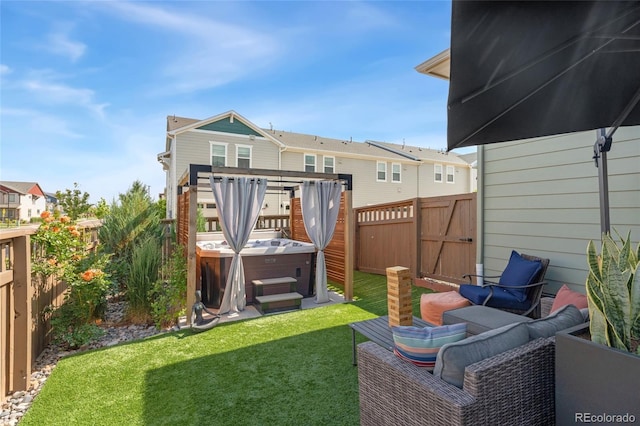 20998 E 60th Pl, Aurora, CO 80019 - rear view of property with a hot tub, a fenced backyard, and a residential view