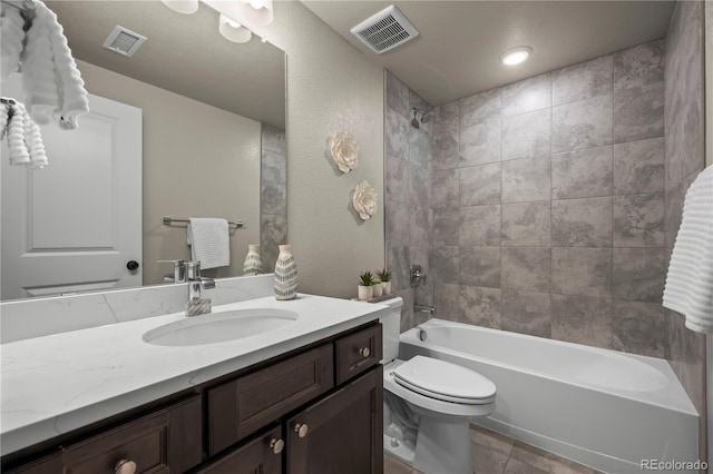 8244 S Queen St, Littleton, CO 80127 - full bath with vanity, toilet,  shower combination, and tile patterned floors