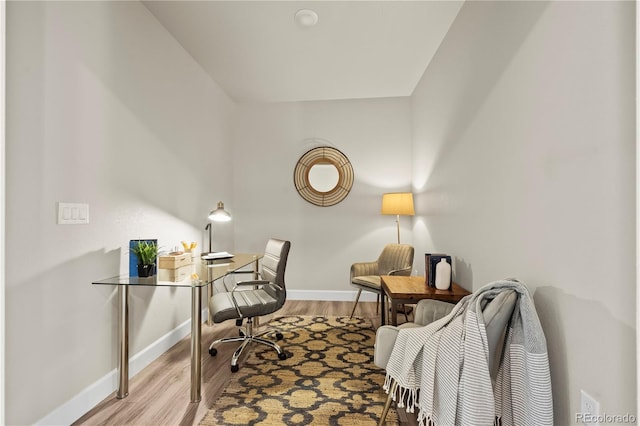 8244 S Queen St, Littleton, CO 80127 - office area with wood finished floors and baseboards