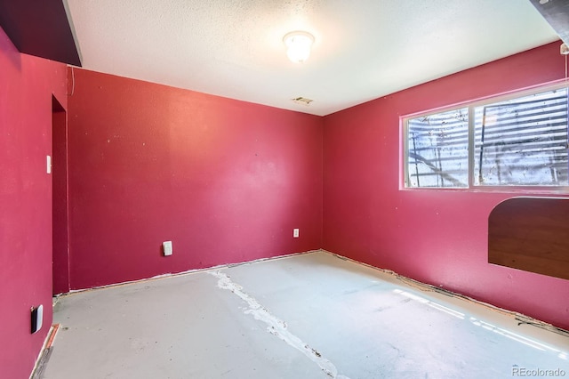 1961 Danube Way, Aurora, CO 80011 - unfurnished room featuring concrete flooring
