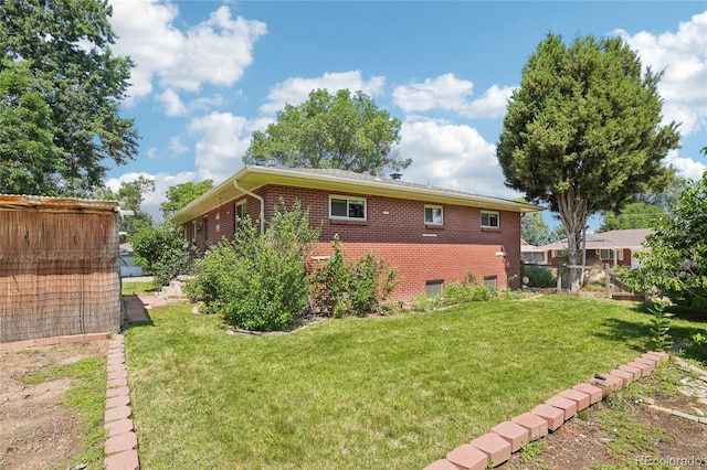 6920 W 47th Pl, Wheat Ridge, CO 80033 - view of home's exterior with brick siding
